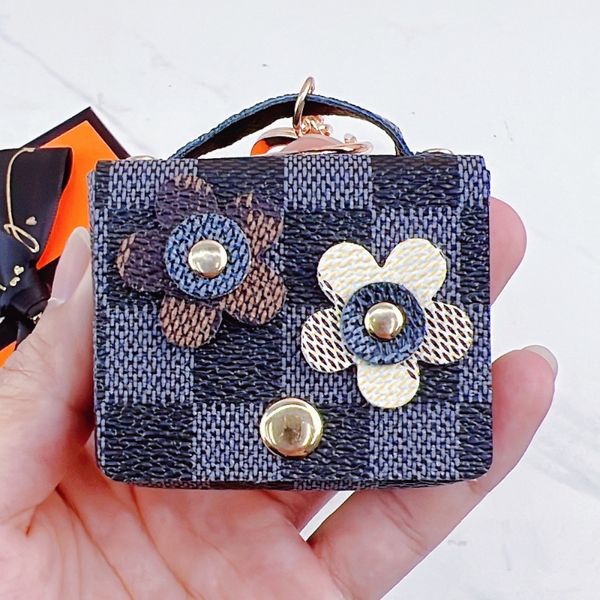 Creative vieille fleur en cuir fleur écouteur sac porte-clés populaire en ligne Mini sac porte-clés petit cadeau en gros