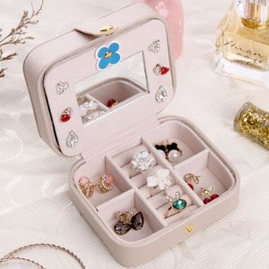 Bodes de bijoux de voyage portables créatives Boîte d'oreilles Boîte de rangement de rangement en cuir