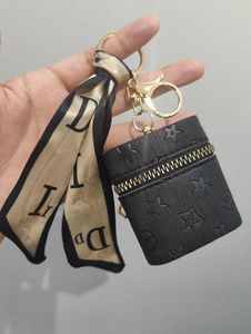 Créativité presbytie voiture porte-clés porte-monnaie pendentif breloque bijoux porte-clés mode PU cuir fleur grille concepteur métal porte-clés