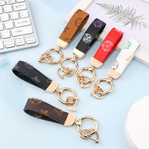 Creativiteit Presbyopie Print Autosleutelhanger Tas Hanger Charme Sieraden Sleutelhangerhouder voor Mannen Cadeau Mode PU-leer Bloemenraster Ontwerp Metalen sleutelhangeraccessoires