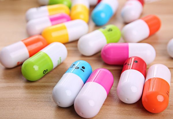 Creativo Regalo Pillole Fortunato Che Desiderano Bottiglia Capsula Pill bolígrafo dibujos animados telescópico cápsula pluma con expresión regalo