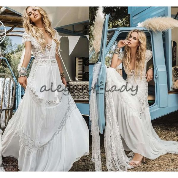 Crochet mariage Vintage plage dentelle robes bohème Il Raviv manches courtes col en v fluide Flare été vacances robe de mariée