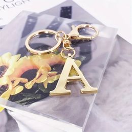 Carta transfronteriza de la personalidad Personalidad de acero inoxidable Cadena de llave colgante de oro Liebre del anillo de oro