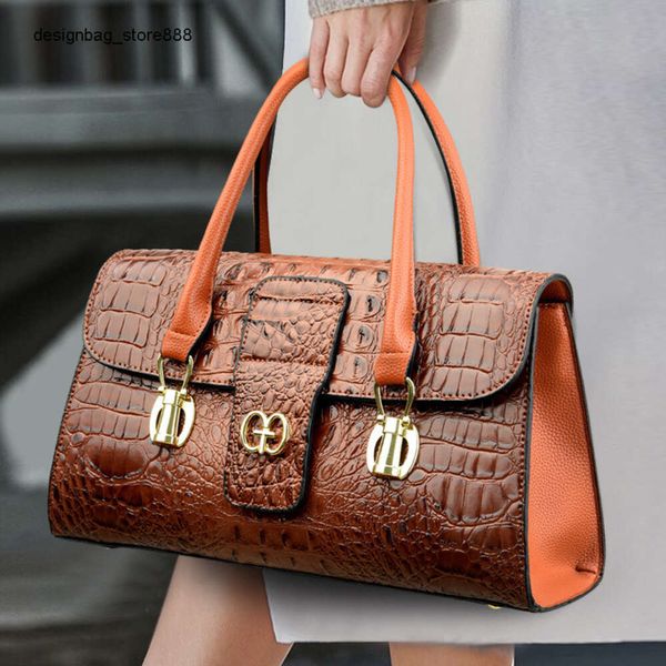 Bolsos de marca de moda al por mayor transfronterizos Bolso de mujer con textura de aire de mano con patrón de cocodrilo Nueva moda y elegante bandolera de un hombro para mujer