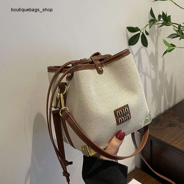 Bolsos de marca de moda al por mayor transfronterizos, bolso de hombro de moda con empalme Dign para mujer, nuevo cubo cruzado minimalista