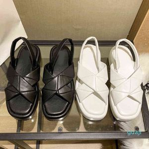 Sandales à semelles épaisses croisées femmes triangulaires standard en cuir retour voyage bande muffin décontracté chaussures simples