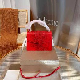 Bolsas de diseñador Bolsas cruzadas de lujo Bolsas serpentinas de alta calidad Moda de oro Handbag Bag Atmósfera de cuero genuino 220314