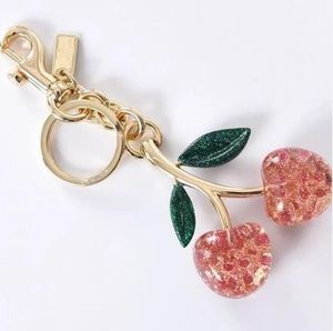 LLavero de cereza de cristal, colgante de bolso femenino, accesorios exquisitos para coche con caja de regalo