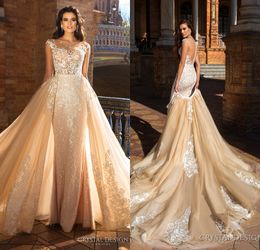 Crystal Design 2020 Bridal Capped Sleeve Juweel Neck Zwaar geborduurd lijfje Afneembare rok schede trouwjurken lage rug lange trein