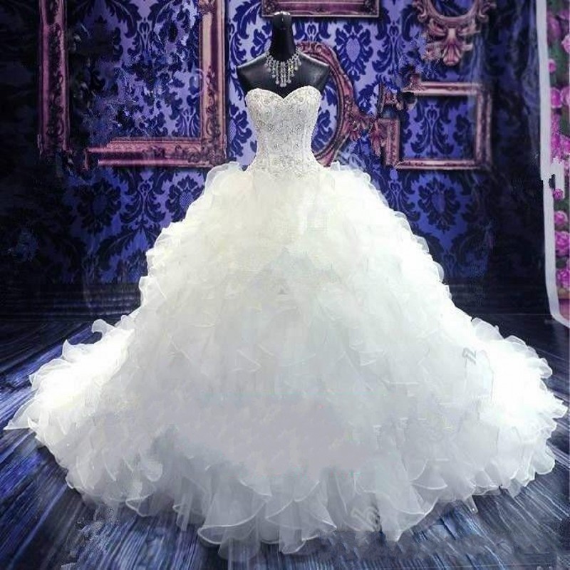 Crystal Dresses Pärlor Stropplös bollklänning bröllop snör upp golvlängd Organza brudklänningar