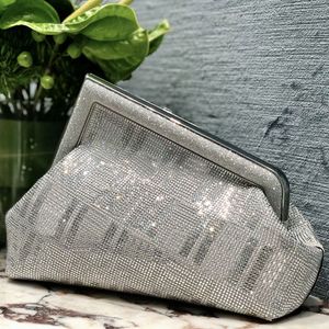 Cristales bolsas de bolsas de diseñador de diseñador bolso de embrague para mujer Bag de lujo de lujo de gamuza de cuero bolso cruzado nuevo mini bolsita de luna de alta calidad bolso de cubo pequeño