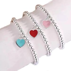 Manchette Designer Bijoux Manchette couple éternel de haute qualité bracelet perlé boule en forme de coeur perle dames vert bleu rose bracelet de charme esprit