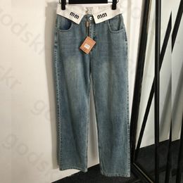 Jeans con cinturón de cintura alta en espía