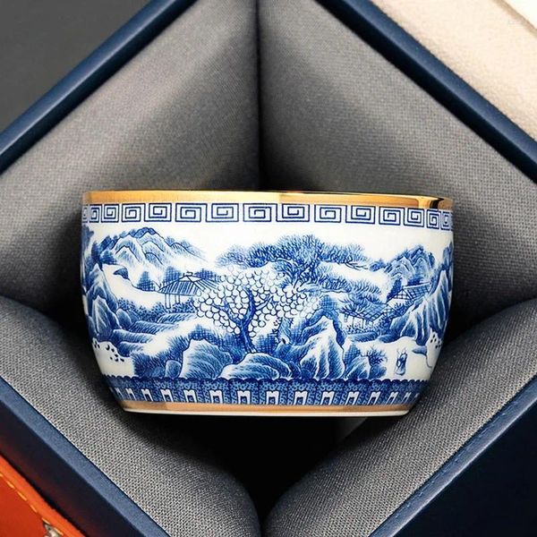 Tazas y platillos Jingdezhen, taza pintada a mano de azul y blanco con incrustaciones de juego de té de cerámica dorado, tazón de alta gama