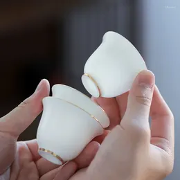 Tazas y platillos, taza de té de porcelana blanca de Jade y grasa de cordero, juego chino de cerámica con contorno maestro en oro, taza de agua para el hogar
