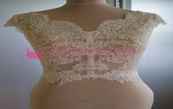 Personalizado elegante transparente sin mangas apliques de encaje chaqueta de boda Bolero de boda vintage chaqueta nupcial envolturas nupciales accesorios nupciales 5411417