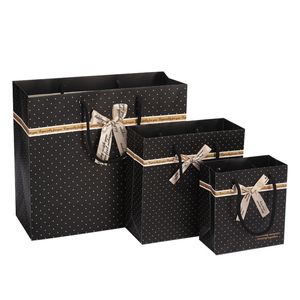 Aangepaste gift tas zwarte vlek handtas chocoladekleding cosmetica product verpakking papieren zak met aangepaste logo afdrukken