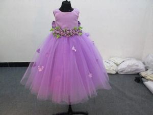 Op maat gemaakte goedkope bloem meisjes jurken met mooie juweel halslijn lila satijn en tule behoorlijk grote bowknot terug pageant jurken voor meisjes
