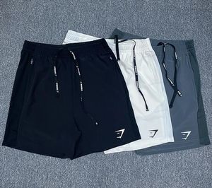 Pantalones cortos deportivos con cremallera de secado rápido para hombre, pantalones deportivos elásticos con estampado de tiburón, ligeros y transpirables, ropa deportiva para adultos, pantalones cortos para correr para gimnasio