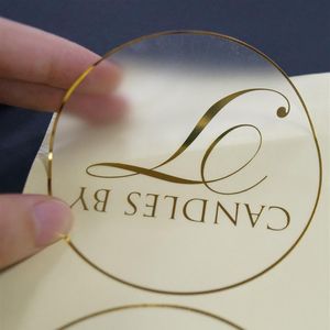 Aangepaste ronde goudtransparantie heldere lijmstickers 1 inch doorschijnende labels met goud logo waterdicht288E