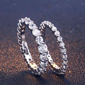 Custarded plaqué rond Cut Cubic Zirconia Gemstone Diamond 925 Sterling Sier bijoux partout dans les anneaux de bande pour femmes248