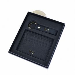 Nom de Stam Hot personnalisable Nom de cardons en cuir authentique Boîte à cadeaux de clés de cartes de cartes en cuir Nouveau navire de gamme de clés de porte-clés de luxe Y2C6 #