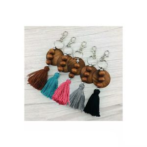 Aangepaste buitenlandse handel Beaded Wooden Bead Keychain Can Print Round and Cotton Tassel Pendant Sleutelhanger