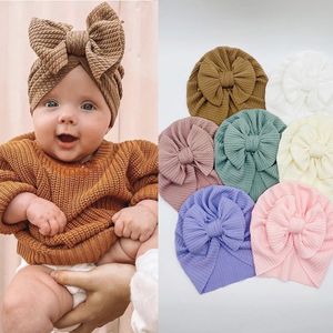 Schattige bogen baby tulband hoed zacht katoenen kinderen baby meisje jongens hoeden beanie stevige kleur pasgeboren pet motorkap headwrap kinderen caps