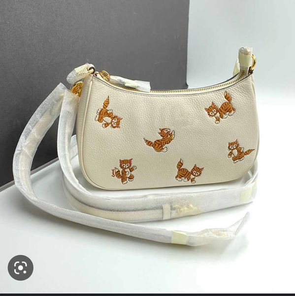 Cute Cat bolsos de diseñador bolsos de mano para mujer Print Armpit Bag Mahjong Bag Lychee Grain Cowhide Handbag 230420