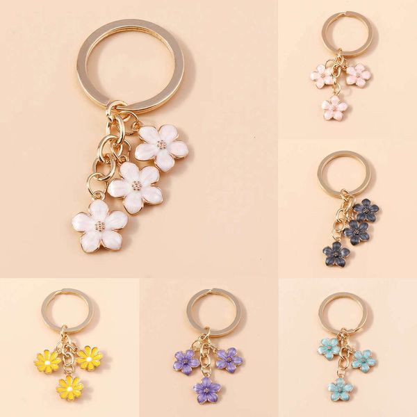 Lindo llavero de esmalte Colorido Sakura Flower Key Anillo de llave dulce para mujeres Accesorios para automóviles Regalos de joyería