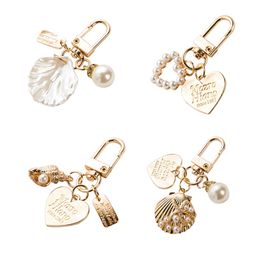 Leuke liefdesbrief Shell Conch Pearl Charm Riem Lanyard Metal Golden Keychain Kit Girls Bag Charms Car Keyring Fashion Jewelry voor Apple AirPods Telefoon