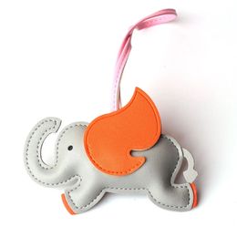 Mignon charmant cuir cuir animal chiot chien keychain éléphant suspendre voiture clés de la chaîne de clés de filles sacs d'école charme accessoires 240428