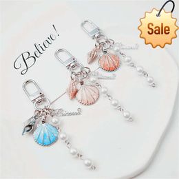 Mignon perle conch key chaîne pendentif fashion charme metal joelry accessoires de femmes bagaux de sac