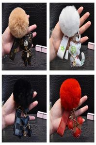 Clés de pompe mignons de mode Cat en peluche en peluche ours de clés de clés de clés cadeaux femmes pu cuir boucles de voiture sac charme accessoires hommes 6312404