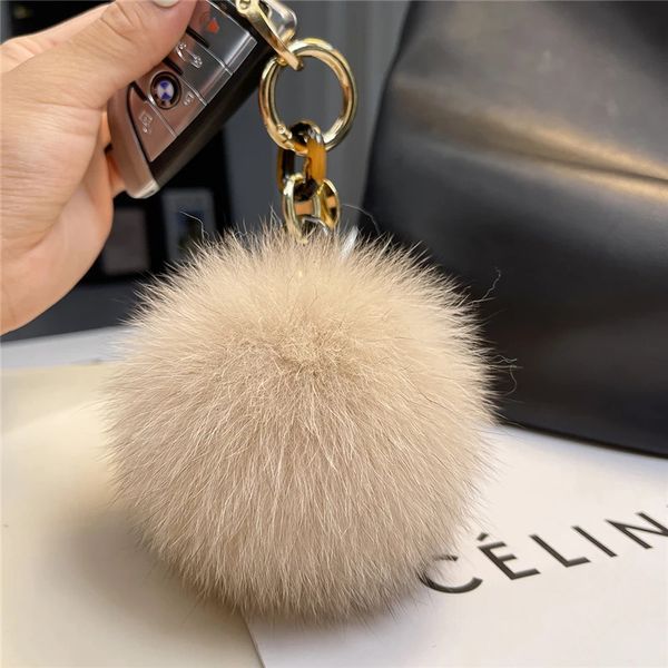 Mignon réel renard boule de fourrure porte-clés femmes sac à main charme pendentif en peluche ornements voiture clé en métal anneau chaîne de luxe bibelots cadeaux 240103