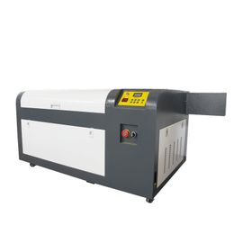 Cuchilla de corte CNC enrutador máquina de corte por láser cortador de madera modelo tela adhesiva acrílica publicidad CO2 grabador láser pequeño 4060