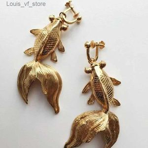 Design de lustre en peluche en or unique Fish Points suspendus Mariage d'oreilles Party No Ear Trou Bijoux Femmes Clip H240423