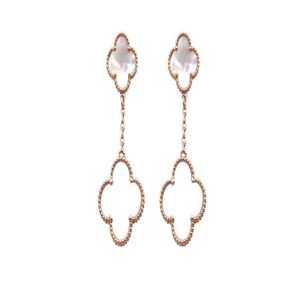 Dangle Chandelier Boucles d'oreilles à fleurs à quatre feuilles Noir et blanc Coquilles vertes rouges Double Clover Tide Women039S Mode E1448794 Drop Del Dht3U