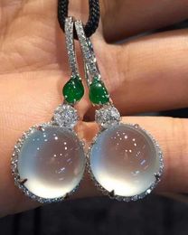 Chandelier de luxe de luxe Route de lune d'oreille pour femmes pour femmes magnifiques boucles d'oreilles en pierre verte en forme de métal en forme de métal en forme de zircon H240423