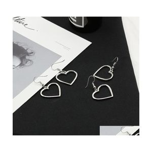 Dangle Lustre Simple Conception Sier Couleur Creux Coeur Boucles D'oreilles Pour Les Femmes Marque De Mode Oreille Manchette Piercing Dangle Boucle D'oreille Gif Dha0Y