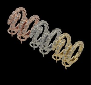 Dangle Chandelier Marque de bijoux de luxe de haute qualité Couple de mode européenne et américaine Boucles d'oreilles en os de serpent à tête de serpent avec diamant