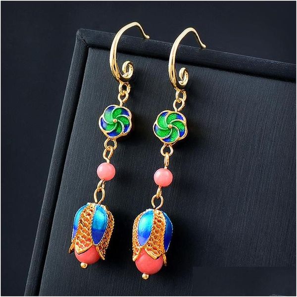 Boucles d'oreilles en émail à balle bleue verte de style vintage.