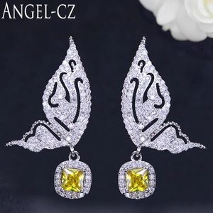 Boucles d'oreilles ANGELCZ mignon symétrique papillon conception Micro pavé CZ Zircon femmes mode coréenne goutte bijoux avec pierre jaune AE178