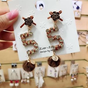 Boucles d'oreilles en peluche de lustre de la mode