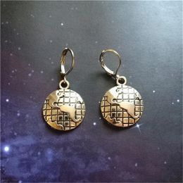 Boucles d'oreilles en peluche de terre de terre de la terre