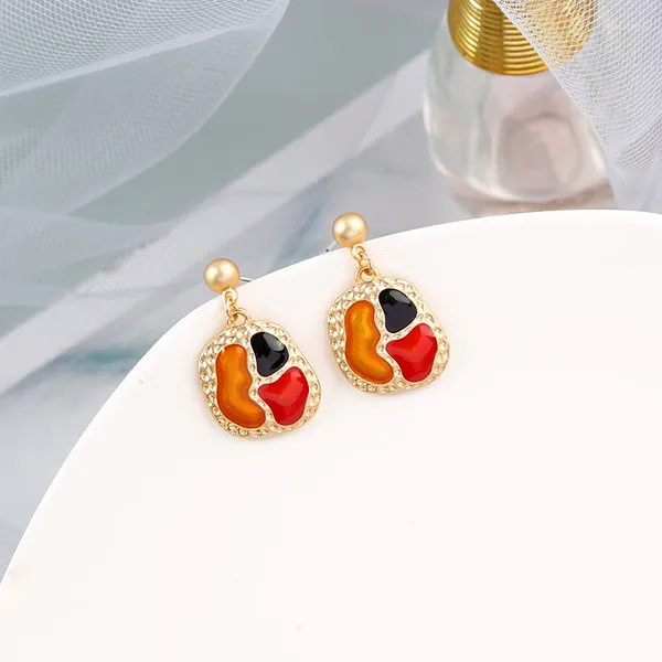 Boucles d'oreilles en peluche d'oreilles européennes de contraste d'orange à l'émail épissant la gouttes de pendentif géométrique pour les femmes bijoux de mode en gros