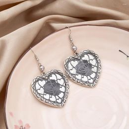 Boucles d'oreilles pendantes en alliage de mode incrusté de strass et feuille de cuivre creuse, cœur Vintage pour femmes, produits tendance, bijoux de fête pour filles