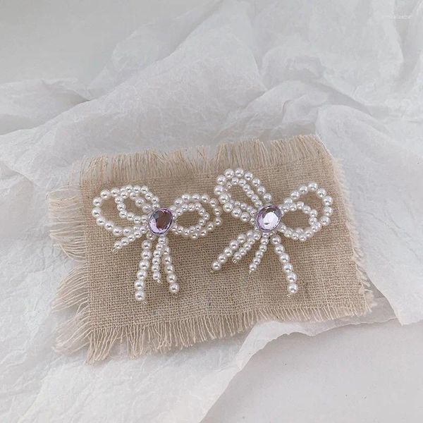 Pendientes colgantes Joyería exagerada de moda Súper Hada Estrella de perlas de doble arco con el mismo diseño Retro Sweet Girl al por mayor.