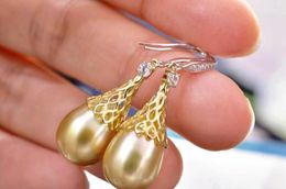 Boucles d'oreilles pendantes magnifiques boucles d'oreilles en perles d'or des mers du Sud 10-11mm 925s
