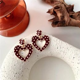 Boucles d'oreilles enveloppées en forme de coeur à pois